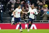 Harry Winks and Lucas Moura celebrate getting Tottenham back on track