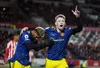 Scott McTominay celebrates a Manchester United goal with striker Marcus Rashford