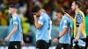 Uruguay’s Luis Suarez , 2nd from left, cries after the World Cup group H soccer match between Ghana and Uruguay