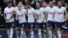 Tottenham players celebrate with Oliver Skipp