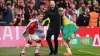 Manchester United manager Erik ten Hag, centre, celebrates with Lisandro Martinez, left, and Antony 