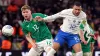 Republic of Ireland’s Nathan Collins, left, and France’s Kylian Mbappe