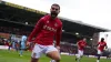 Wrexham’s Elliot Lee celebrates opening the scoring (PA)