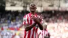 Brentford’s Ethan Pinnock celebrates his winning goal (PA)