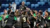 Jamaica celebrate their point against France (Mark Baker/AP)