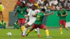 Guinea captain Francois Kamano (centre) was sent off following a VAR review (Sunday Alamba/AP)