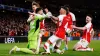 Arsenal celebrate after David Raya saved two penalties in the shoot-out (Zac Goodwin/PA)