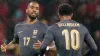 England’s Ivan Toney, left, celebrates with Jude Bellingham after scoring from the penalty spot (Kirsty Wigglesworth/AP)