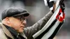 Singer-songwriter Mark Knopfler poses for photographers at the ground ahead of the Premier League match at St. James’ Park, 