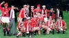 Mark Robins (middle, back row) celebrates winning the FA Cup in 1990 (PA Archive).