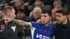 Chelsea’s Enzo Fernandez gets instructions from manager Mauricio Pochettino during the Premier League match at the Tottenham