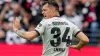 Bayer Leverkusen’s Granit Xhaka celebrates his side’s opening goal against Frankfurt (Michael Probst/AP)