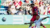 Canada’s Jonathan David, back, scores his side’s opening goal against Peru (AP Photo/Ed Zurga)