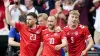 Christian Eriksen, centre, celebrates with team-mates after scoring Denmark’s opener (Nick Potts/PA)