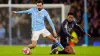 Manchester City’s Bernardo Silva and Real Madrid’s Jude Bellingham (PA)