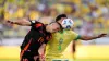 Colombia’s Rafael Santos Borre, left, and Brazil’s Marquinhos battle for the ball during a Copa America Group D soccer match