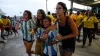 Fans try to enter the stadium following delays to the Copa America final in Miami (Lynne Sladky/AP)