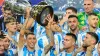 Angel Di Maria celebrates with the trophy after Argentina defeated Colombia in the Copa America final (Julio Cortez/AP)