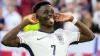 England’s Bukayo Saka celebrated scoring his penalty in the shoot-out win over Switzerland (Darko Vojinovic/AP)