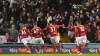 Barnsley’s Max Watters (second left) celebrates scoring their side’s third goal of the game with team-mates Luke Thomas (lef