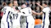 Harry Kane, second left, celebrates his second goal against Finland with team-mates (Nick Potts/PA)