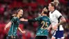 Sara Dabritz, left, celebrates after scoring Germany’s decisive fourth goal (John Walton/PA)