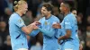 Erling Haaland, left, celebrates with team-mates (Martin Rickett/PA)