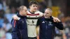 Harry Maguire, centre, is helped from the pitch (Nick Potts/PA)