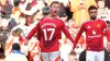 Rasmus Hojlund (centre) celebrates with Alejandro Garnacho after scoring their side’s second goal of the game during the Pre