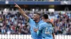 Mateo Kovacic (left) celebrates with Phil Foden after scoring Manchester City’s second (Martin Rickett/PA)