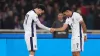 Curtis Jones (left) celebrates with Morgan Gibbs-White after scoring England’s third goal against Greece (Bradley Collyer/PA