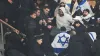 Fans clashed in the stands at the Stade de France (Thibault Camus/AP)