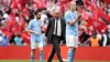 Pep Guardiola (centre) claims he was joking when he said his players were “hungover” at Wembley (Nick Potts/PA)