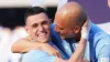 Pep Guardiola celebrating with Phil Foden (Martin Rickett/PA)