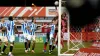 Huddersfield goalkeeper Chris Maxwell punches the ball into his own net for Tamworth’s winner (Bradley Collyer/PA)