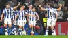 Real Sociedad’s players celebrate after Sheraldo Becker scored the winning goal against Barcelona (Miguel Oses/AP)