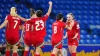 Lily Woodham, right, celebrates scoring for Wales in their Euro 2025 play-off final against the Republic of Ireland (David D