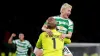 Celtic goalkeeper Kasper Schmeichel (front) and Celtic’s Daizen Maeda celebrate after their team won in a penalty shoot out 