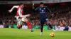 Arsenal’s William Saliba and Manchester United’s Marcus Rashford (right) (PA)