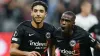 Eintracht Frankfurt’s Omar Marmoush, left, celebrates scoring (PA/DPA)