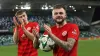 Larne celebrate beating Gent (Liam McBurney/PA)