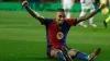 Barcelona’s Raphinha celebrates his side’s fifth goal against Valencia, scored by Fermin Lopez (Joan Monfort/AP)