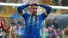 Josh Barrett scored a hat-trick in less than 10 minutes as Aldershot beat Oldham (Nigel French/PA)