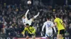 Leeds United’s Ethan Ampadu (top) and Harrogate Town’s Levi Sutton battle for the ball during the Emirates FA Cup third roun