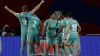 Alexander Sorloth, left, celebrates his stoppage-time equaliser for Atletico Madrid against Barcelona in their Copa del Rey 