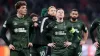 Celtic players stand dejected after the late blow (Andrew Milligan/PA)