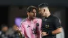 Inter Miami forward Lionel Messi, left, talks with the referee during the first half (Rebecca Blackwell/AP)