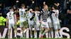 Queen’s Park’s Seb Drozd, centre, is congratulated by team-mates after scoring the winner against Rangers (Steve Welsh/PA)