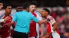 Myles Lewis-Skelly reacts after being shown a red card by referee Michael Oliver (Mike Egerton/PA)