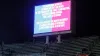 A screen informs fans of the postponement of Barcelona’s game with Osasuna (Joan Monfort/AP)